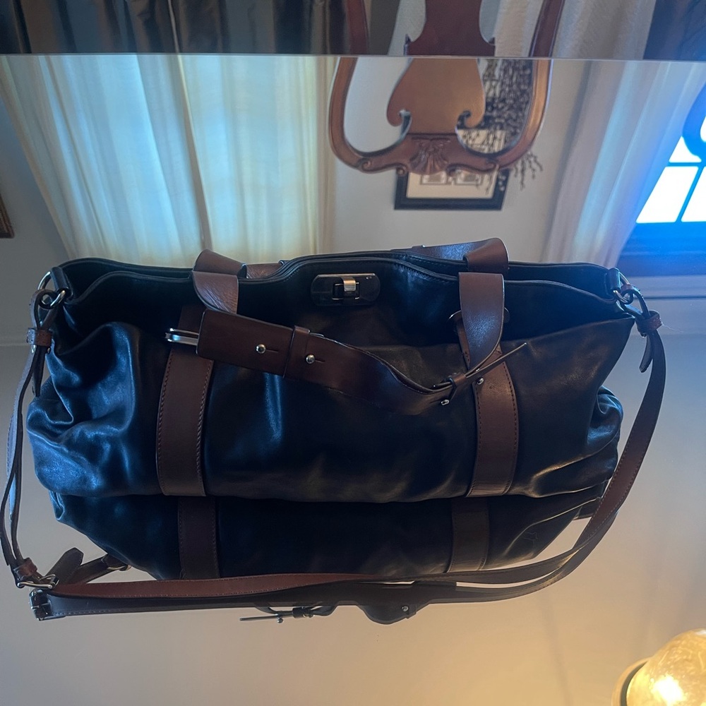 Black with brown handles/trim and shoulder strap